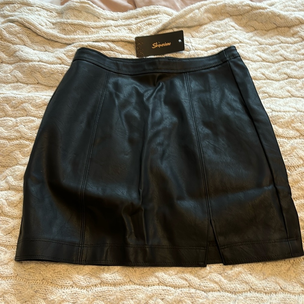 Black leather mini skirt